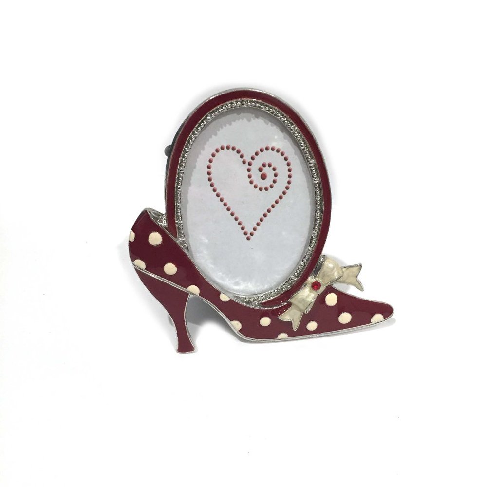 Red and silver bezel oval picture frame